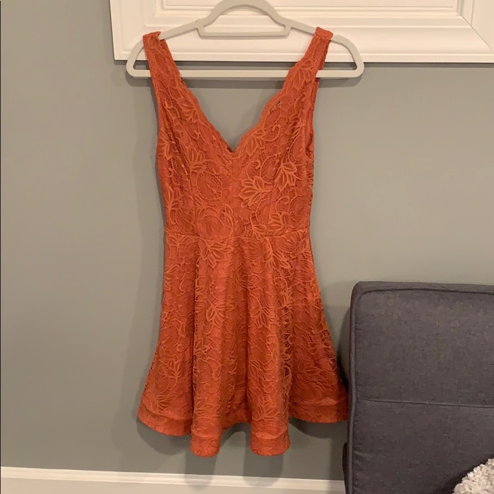 dress, orangish/reddish color